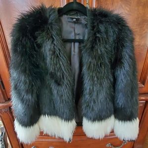 H&M EUC faux fur jacket. Black with white cuffs No size. 20" pit to pit 43" long